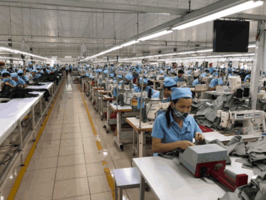 Factory workers producing high-quality fabrics at PT Mayakawa Sejahtera in Indonesia