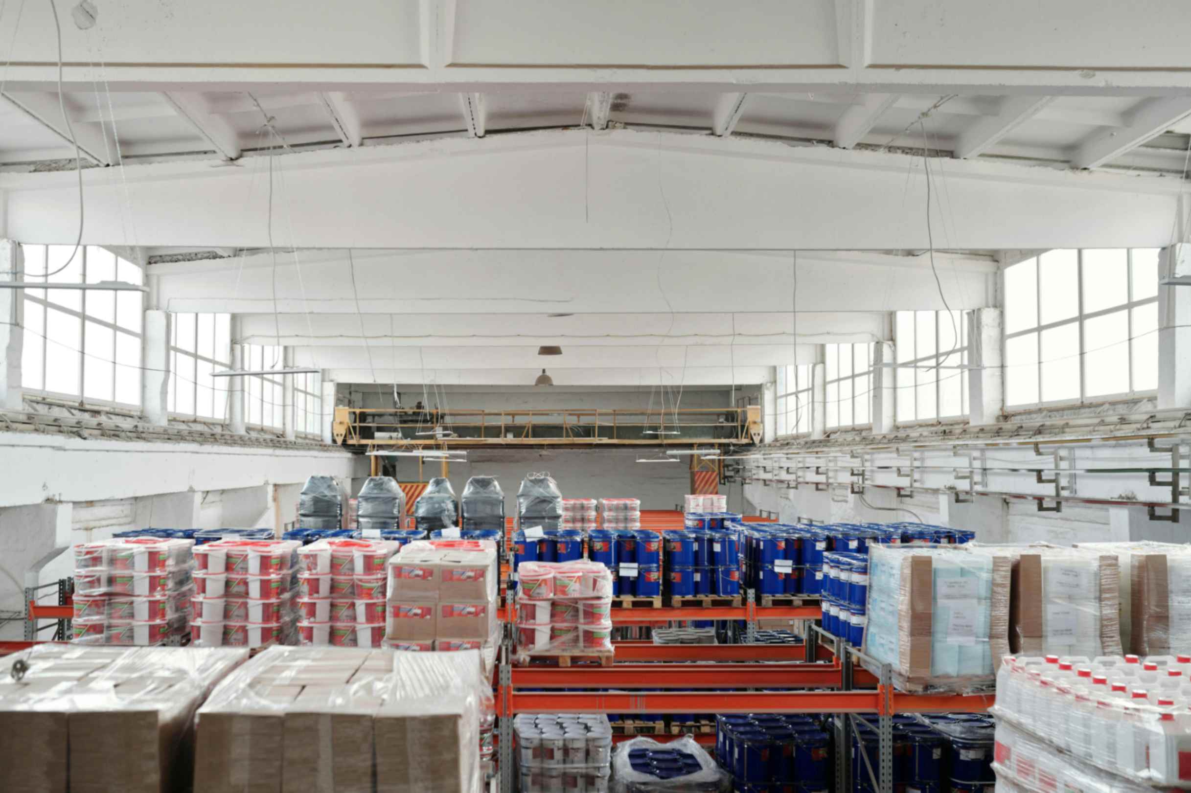 Large warehouse storage of finished fabrics and textiles ready for global export